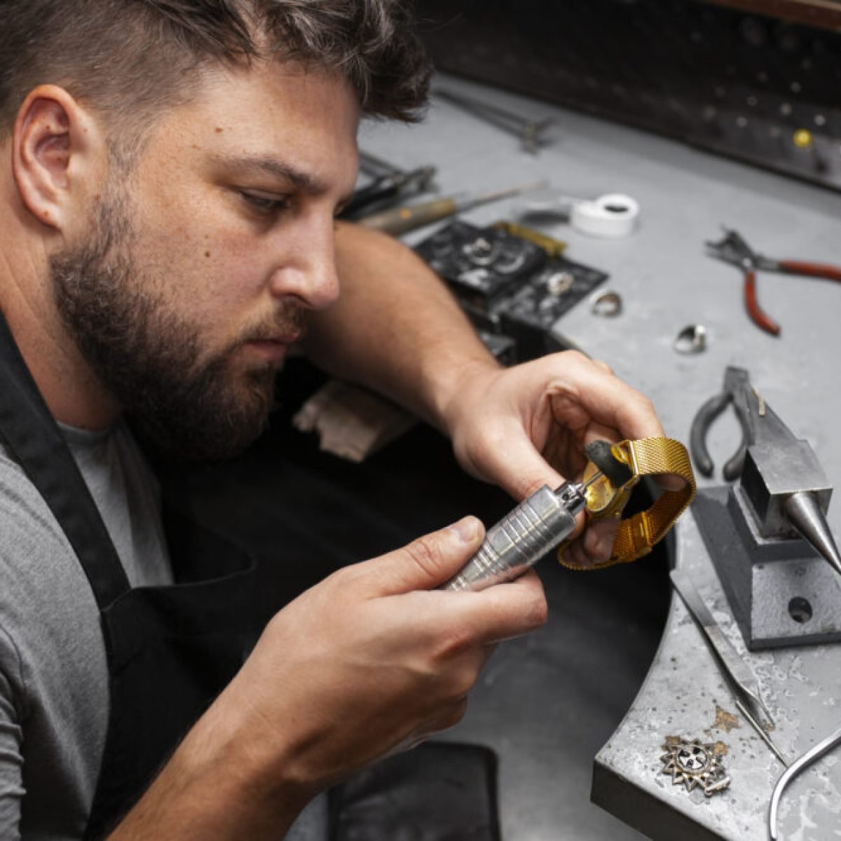 medium-shot-jeweler-making-jewellery